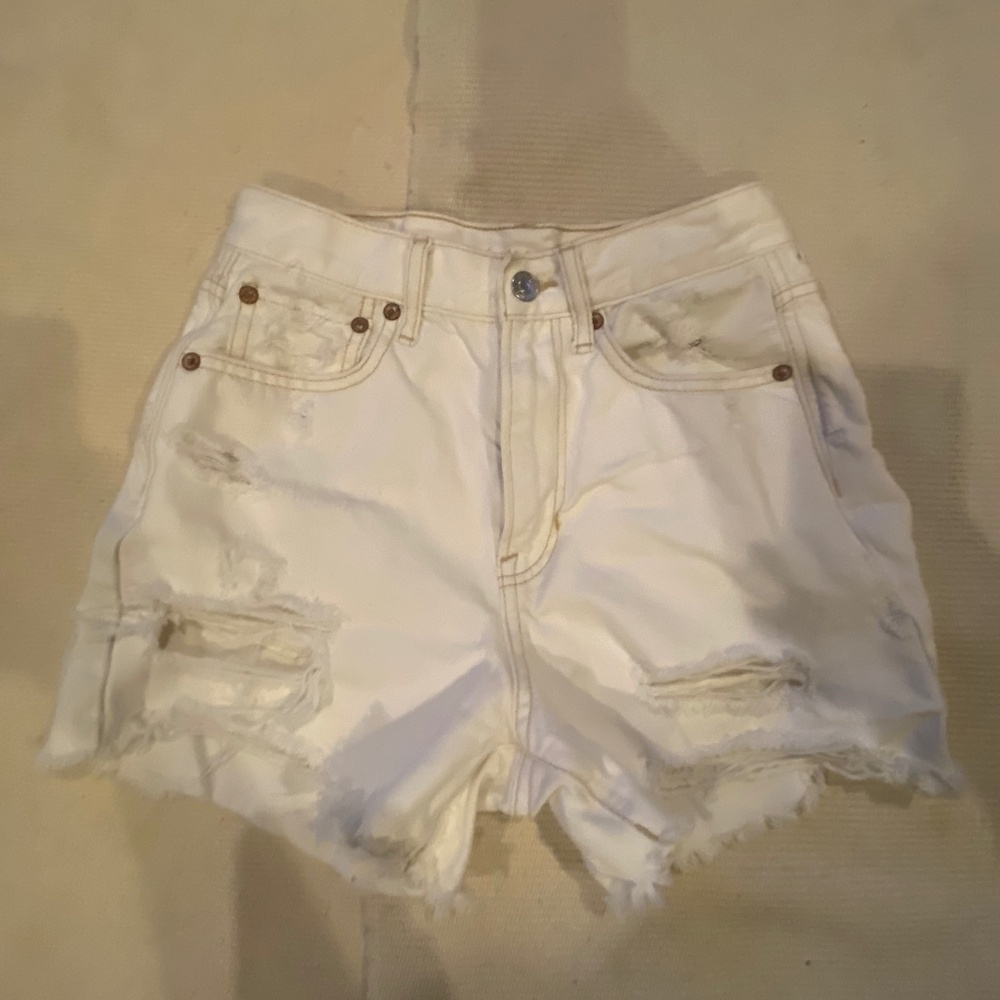 White distressed shorts